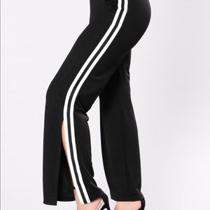 Fashion Nova track pants with slits on the bottom
